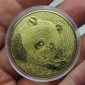 18k Gold Cinese Teddy bear.